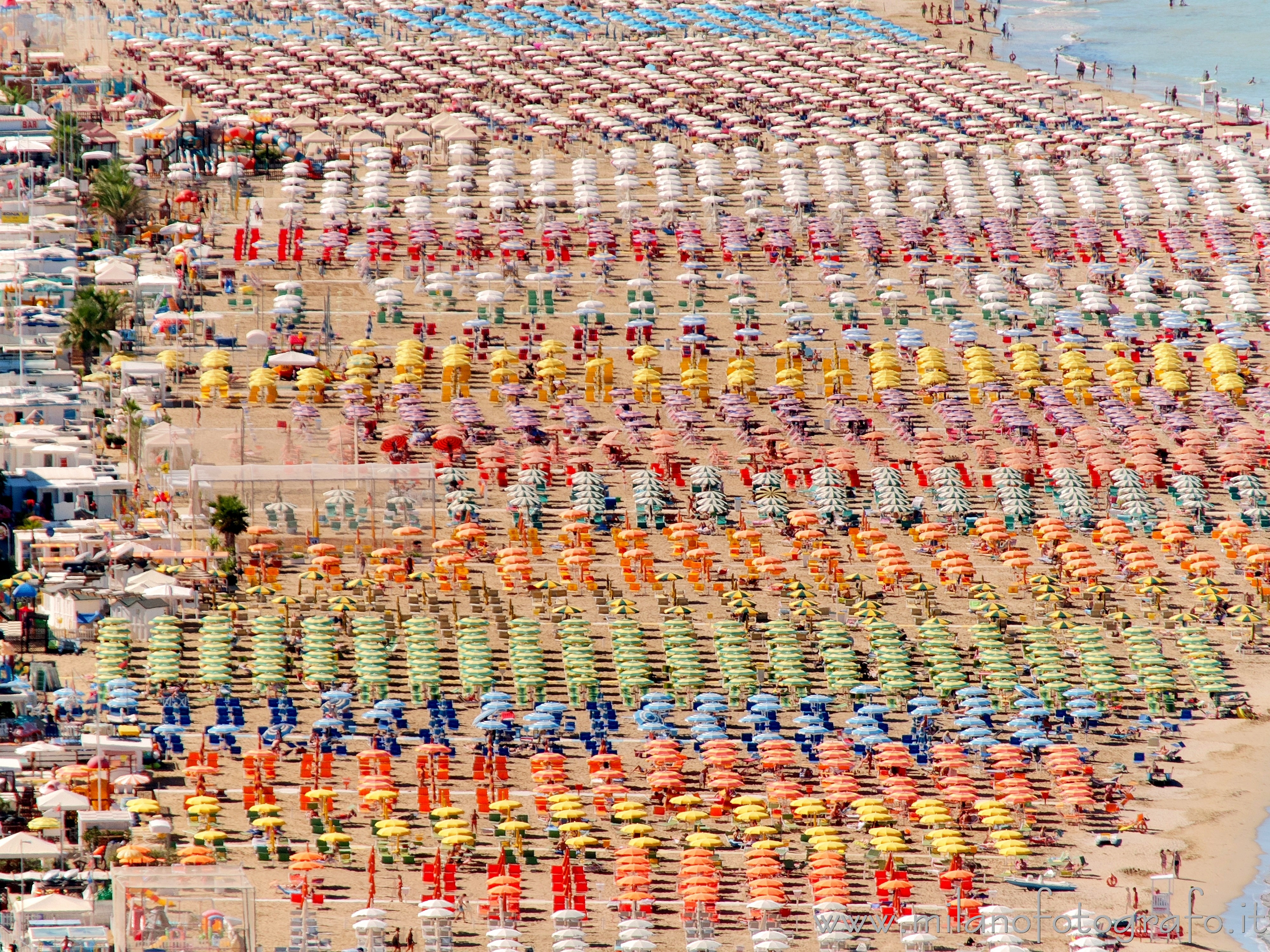 Gabicce Mare (Pesaro e Urbino, Italy) - The beach of Gabicce Mare and its colorful sun umbrellas